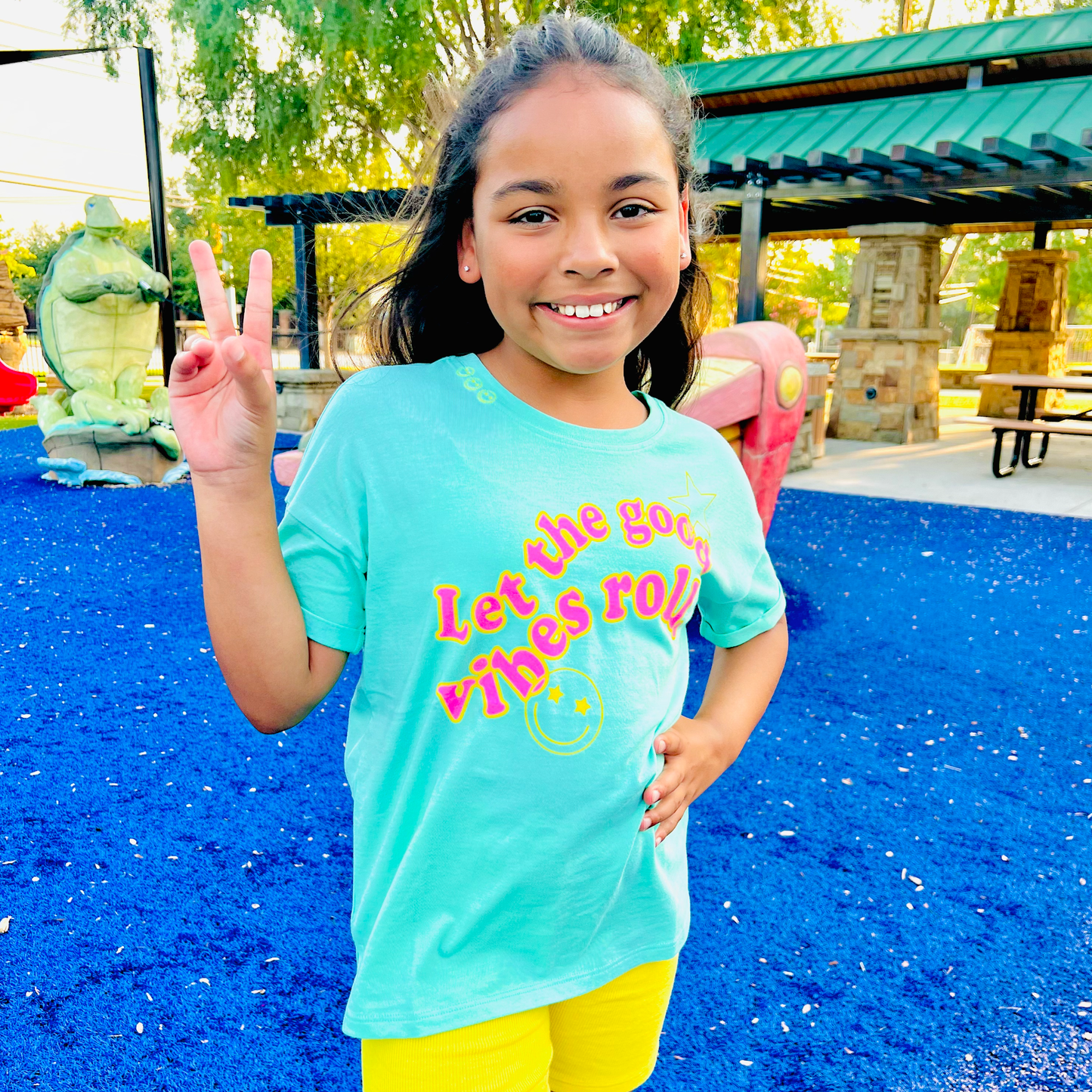 Let the good vibes roll roll cuff tween graphic tee