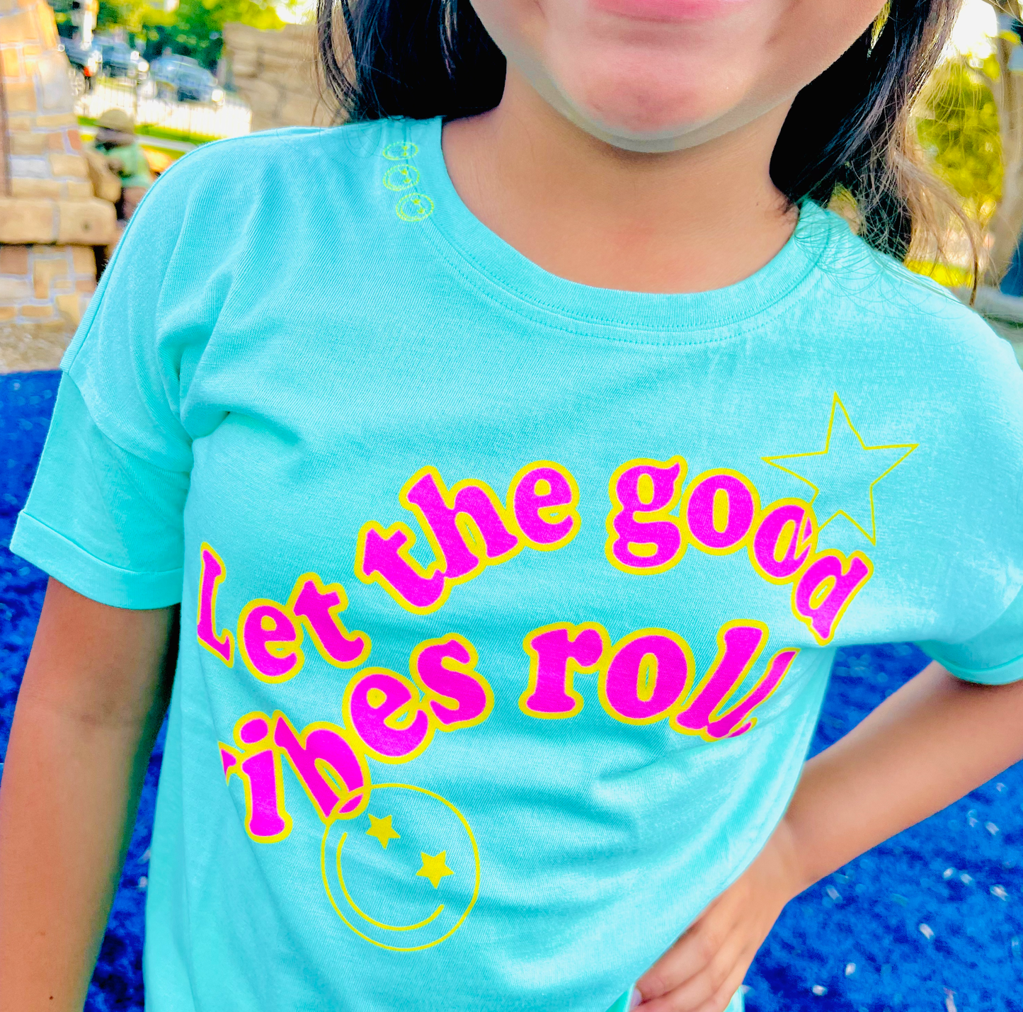 Let the good vibes roll roll cuff tween graphic tee